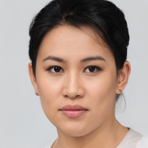 Neutral asian young-adult female with short  brown hair and brown eyes