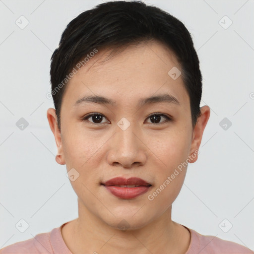 Joyful asian young-adult female with short  black hair and brown eyes