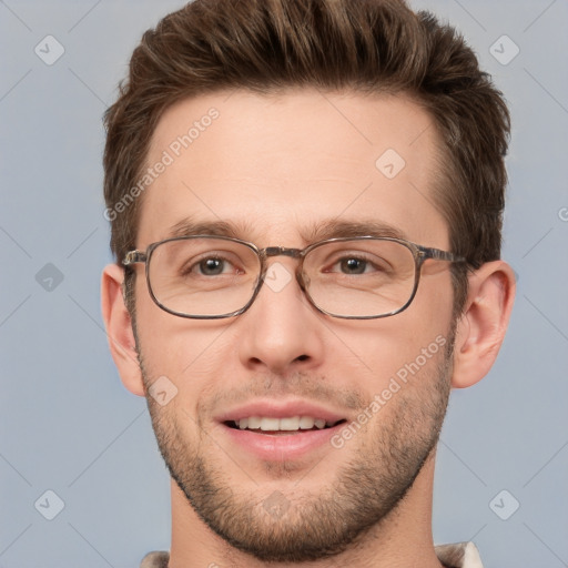 Joyful white adult male with short  brown hair and grey eyes