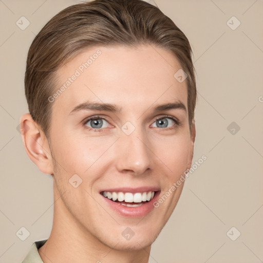 Joyful white young-adult female with short  brown hair and grey eyes