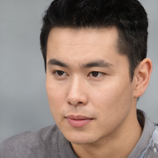 Neutral asian young-adult male with short  black hair and brown eyes