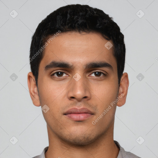 Neutral latino young-adult male with short  black hair and brown eyes