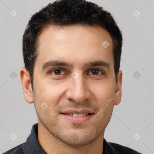 Joyful white young-adult male with short  brown hair and brown eyes