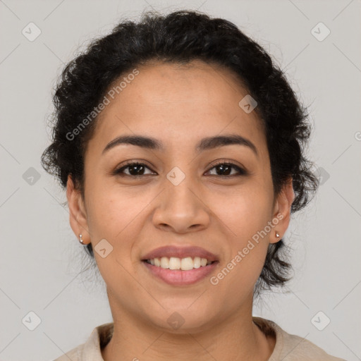 Joyful latino young-adult female with short  brown hair and brown eyes