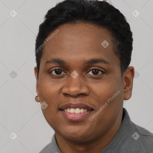 Joyful black young-adult male with short  black hair and brown eyes