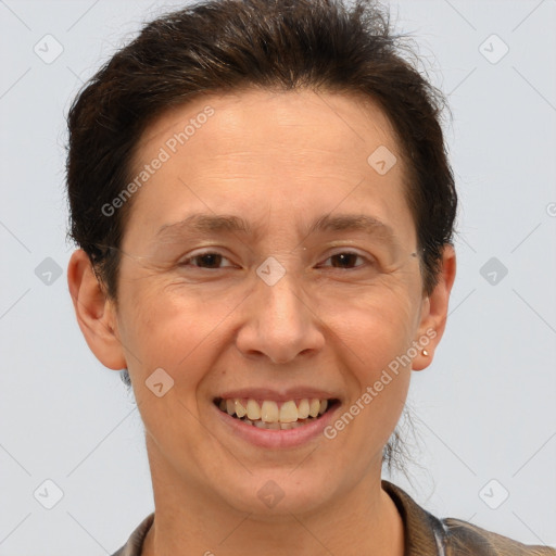 Joyful white adult female with short  brown hair and brown eyes