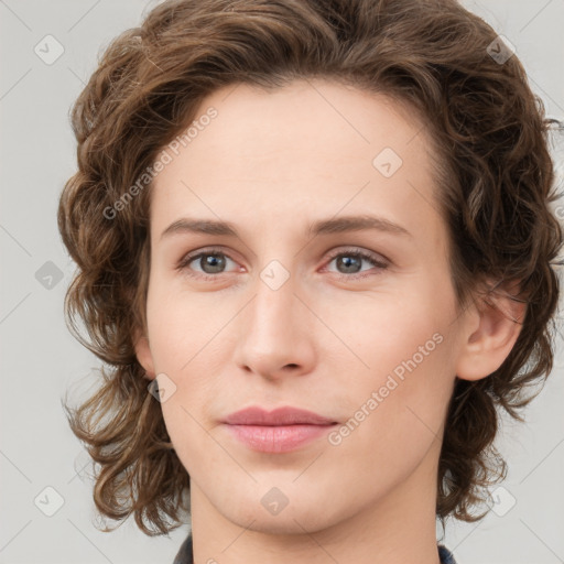 Joyful white young-adult female with medium  brown hair and green eyes