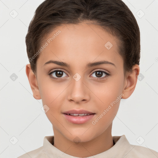 Joyful white child female with short  brown hair and brown eyes