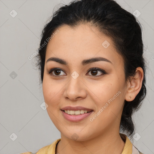 Joyful latino young-adult female with medium  brown hair and brown eyes