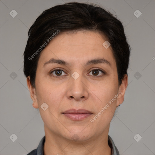 Joyful white adult female with short  brown hair and brown eyes