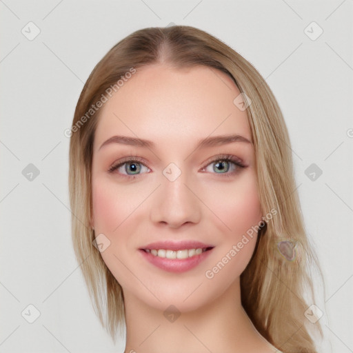 Joyful white young-adult female with long  brown hair and blue eyes