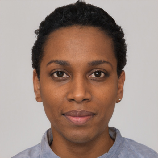 Neutral black young-adult female with short  black hair and brown eyes