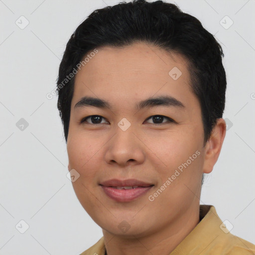 Joyful asian young-adult male with short  black hair and brown eyes