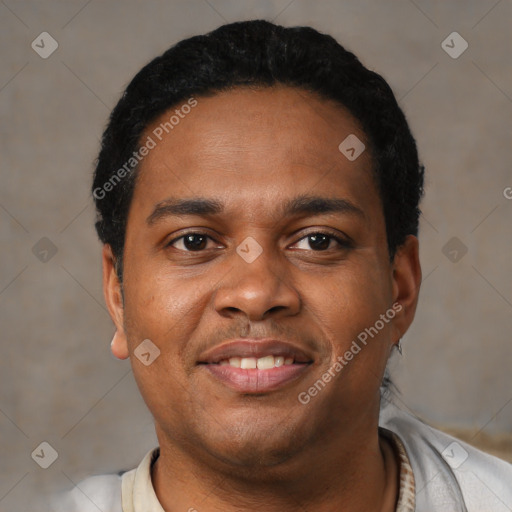 Joyful latino young-adult male with short  black hair and brown eyes