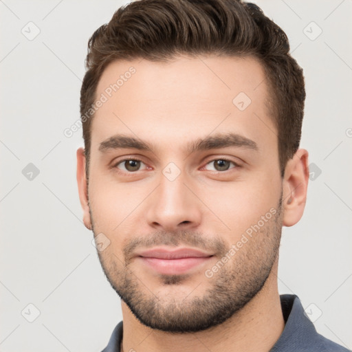 Neutral white young-adult male with short  brown hair and brown eyes