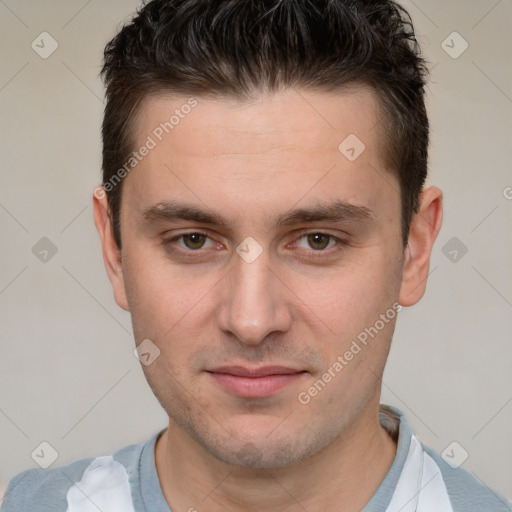 Joyful white young-adult male with short  brown hair and brown eyes