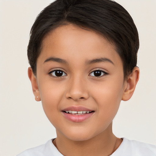 Joyful white child female with short  brown hair and brown eyes