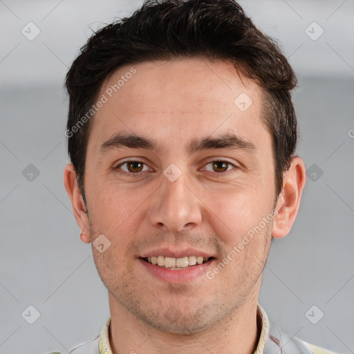 Joyful white young-adult male with short  brown hair and brown eyes