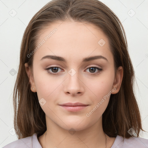 Neutral white young-adult female with long  brown hair and brown eyes