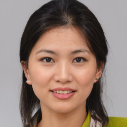 Joyful asian young-adult female with medium  brown hair and brown eyes