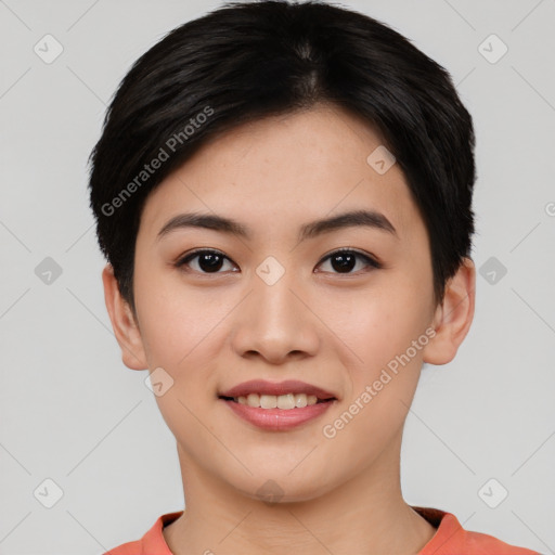 Joyful asian young-adult female with short  black hair and brown eyes