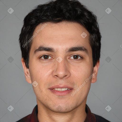 Joyful white young-adult male with short  black hair and brown eyes