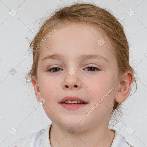 Joyful white child female with medium  brown hair and blue eyes