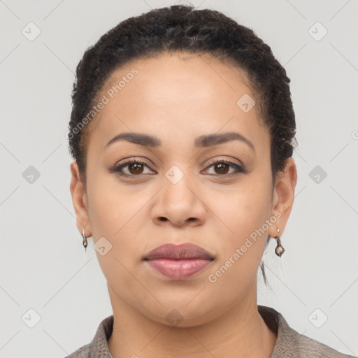 Joyful latino young-adult female with short  black hair and brown eyes