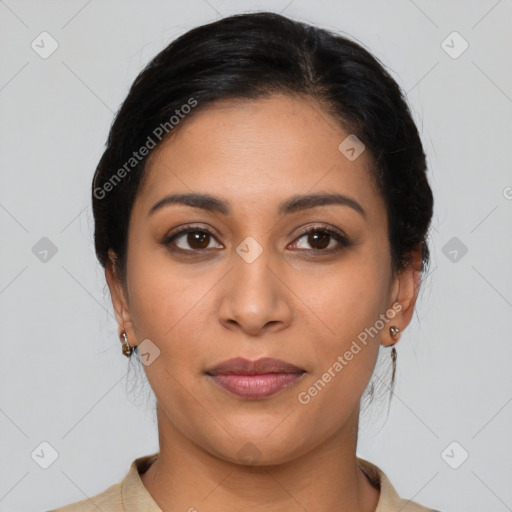 Joyful latino young-adult female with medium  brown hair and brown eyes
