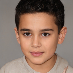 Joyful white child male with short  brown hair and brown eyes