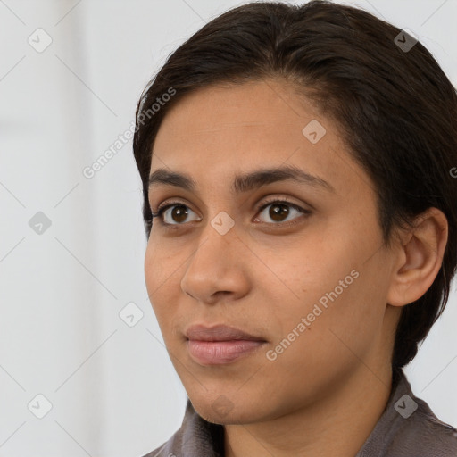 Neutral white young-adult female with short  brown hair and brown eyes