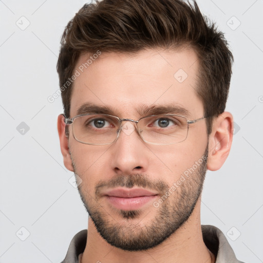 Neutral white young-adult male with short  brown hair and grey eyes