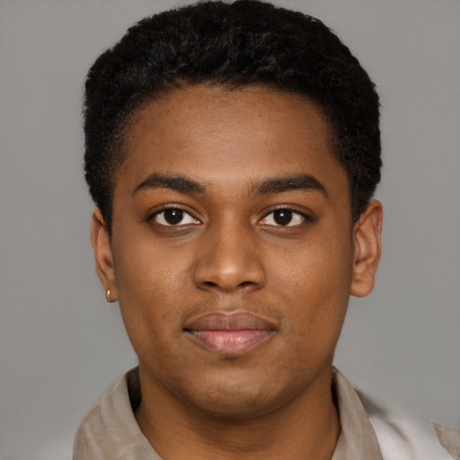 Neutral black young-adult male with short  black hair and brown eyes