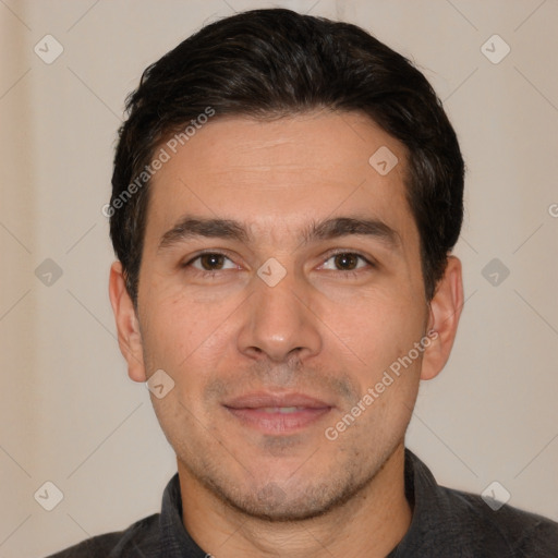 Joyful white adult male with short  brown hair and brown eyes