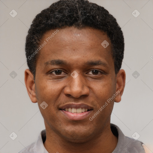 Joyful black young-adult male with short  black hair and brown eyes