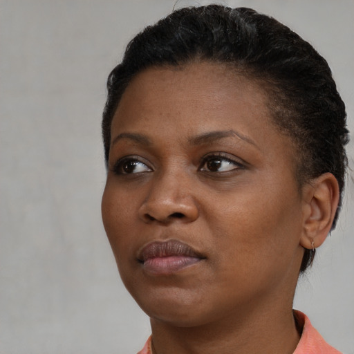 Neutral black young-adult female with short  brown hair and brown eyes