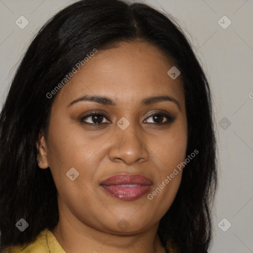 Joyful black young-adult female with long  brown hair and brown eyes