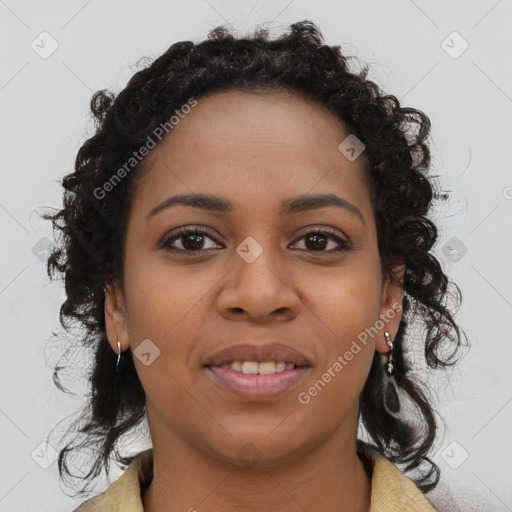 Joyful black young-adult female with medium  brown hair and brown eyes