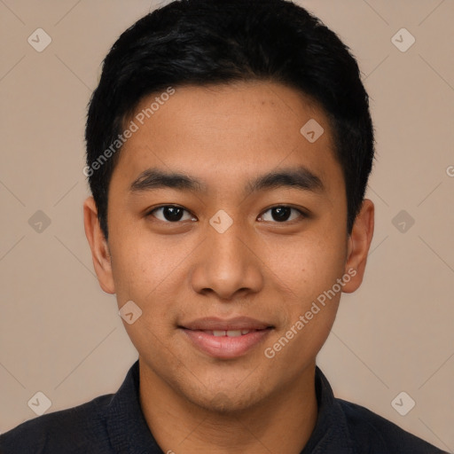 Joyful latino young-adult male with short  black hair and brown eyes