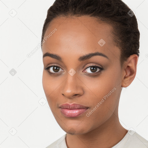 Joyful latino young-adult female with short  brown hair and brown eyes