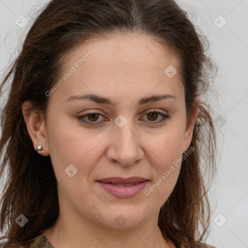 Joyful white adult female with long  brown hair and brown eyes