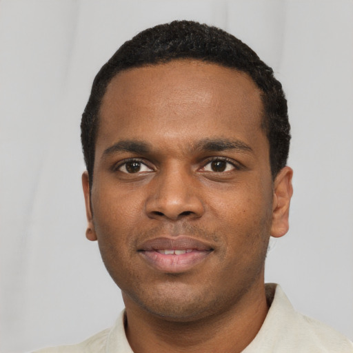 Neutral black young-adult male with short  black hair and brown eyes