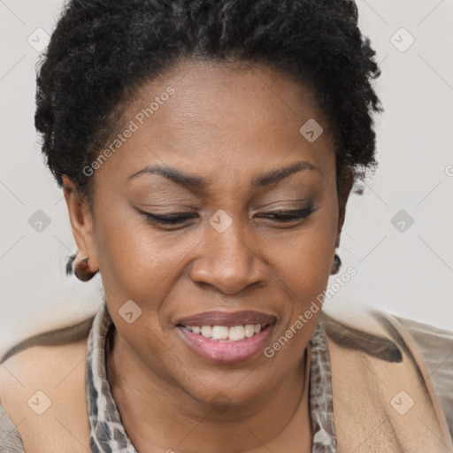 Joyful black adult female with short  brown hair and brown eyes