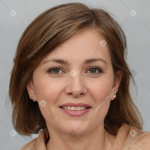 Joyful white adult female with medium  brown hair and grey eyes