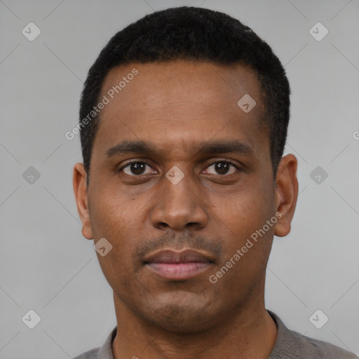 Neutral latino young-adult male with short  black hair and brown eyes