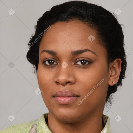 Joyful latino young-adult female with short  black hair and brown eyes