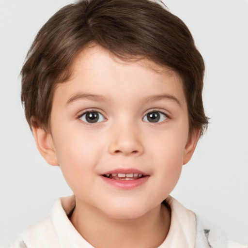 Joyful white child female with short  brown hair and brown eyes