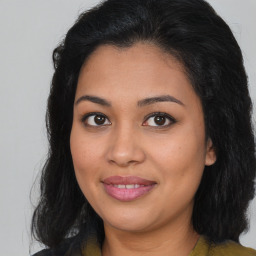 Joyful asian young-adult female with long  brown hair and brown eyes