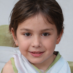 Joyful white child female with short  brown hair and brown eyes