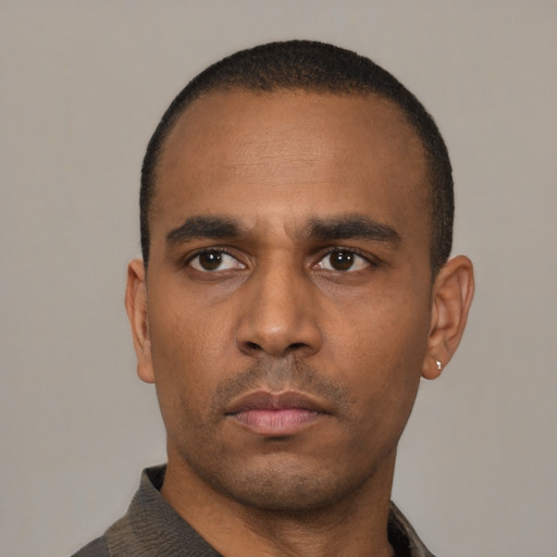 Neutral latino adult male with short  black hair and brown eyes
